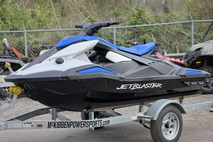 The Image of 2025 Yamaha WaveRunner JetBlaster on trailer, featuring sleek design and vibrant blue accents. - 0