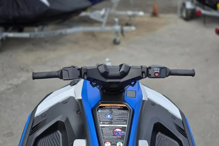Slide: The Image of 2025 Yamaha WaveRunner JetBlaster handlebars, showcasing sleek design and control features. - 10