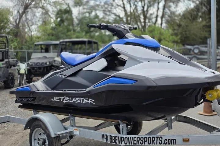 Slide: The Image of 2025 Yamaha WaveRunner JetBlaster on trailer, sleek design, blue and white color scheme. - 11