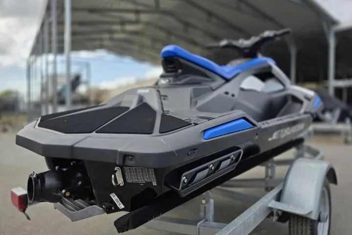 Slide: The Image of 2025 Yamaha WaveRunner JetBlaster on trailer, featuring sleek design and blue accents. - 7