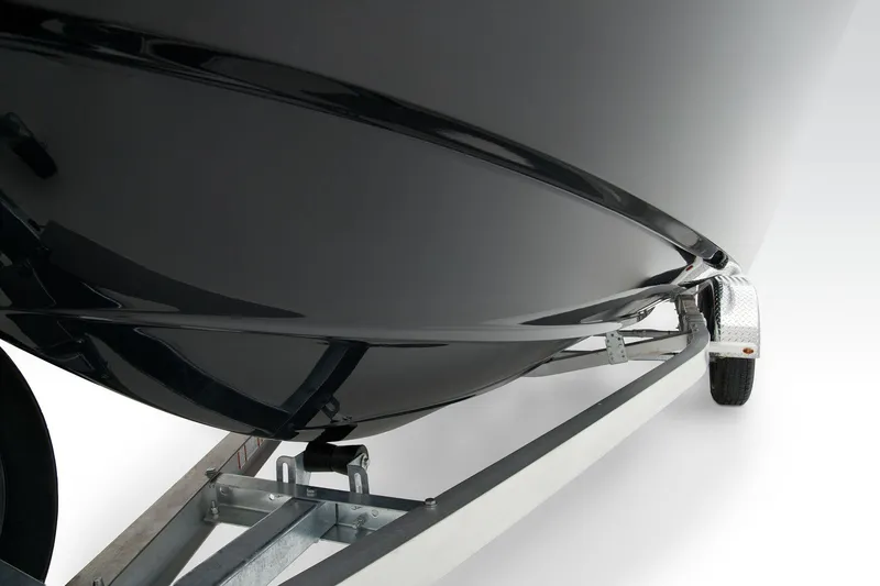 Slide: The Image of Manufacturer Provided Image: 2025 Tahoe T21 boat on trailer, sleek black hull design. - 17