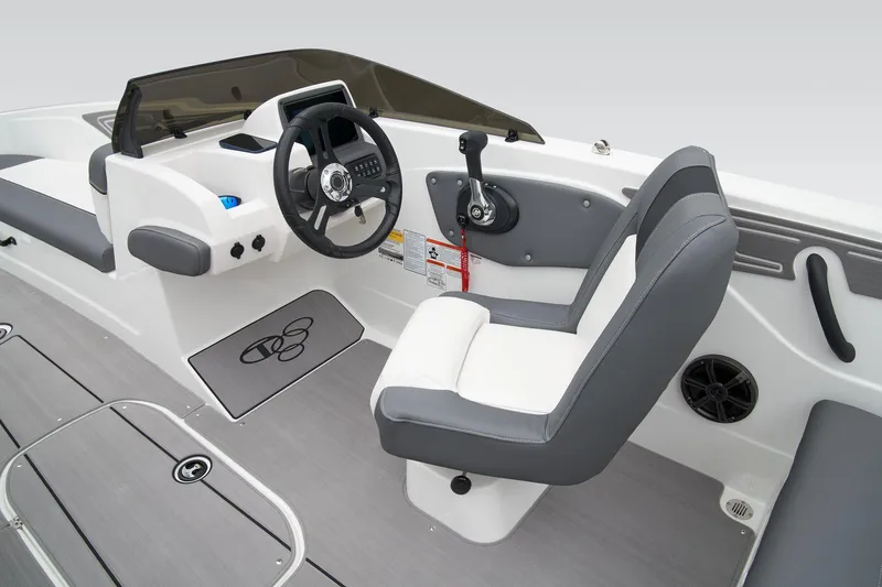 Slide: The Image of Manufacturer Provided Image: 2025 Tahoe T21 boat interior with steering wheel and seating, featuring modern design and controls. - 30