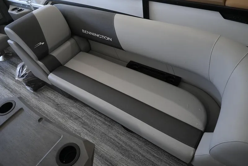 Slide: The Image of 2026 Bennington S Quad Bench 21 SSR, luxurious gray seating on a boat. - 7
