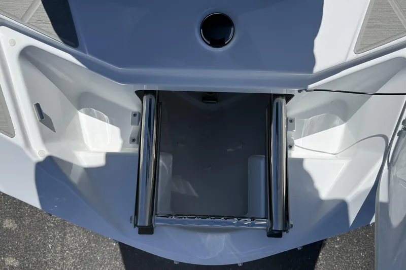 Slide: The Image of 2026 Scarab 255 SE boat ladder compartment, featuring sleek design and stainless steel rails. - 10