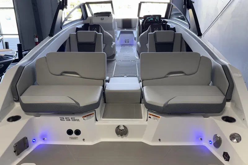 Slide: The Image of 2026 Scarab 255 SE boat interior with modern seating and ambient lighting. - 12