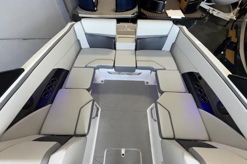 Slide: The Image of Interior of 2026 Scarab 255 SE boat with spacious seating and modern design. - 22
