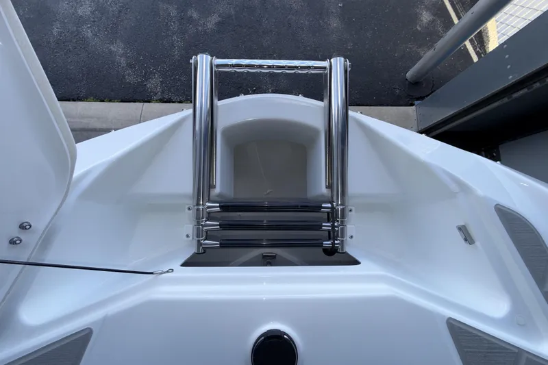 Slide: The Image of 2026 Scarab 255 SE boat ladder and deck detail, showcasing sleek design and functionality. - 27