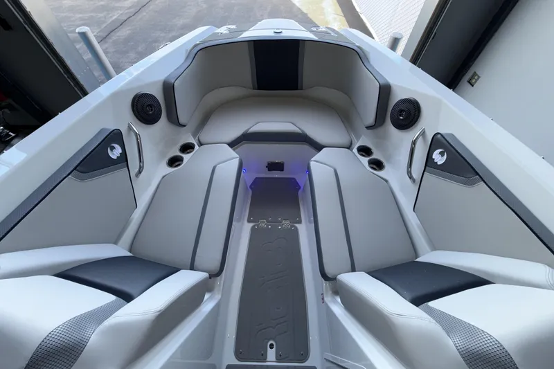 Slide: The Image of Interior of 2026 Scarab 255 SE boat, featuring sleek seating and modern design elements. - 28