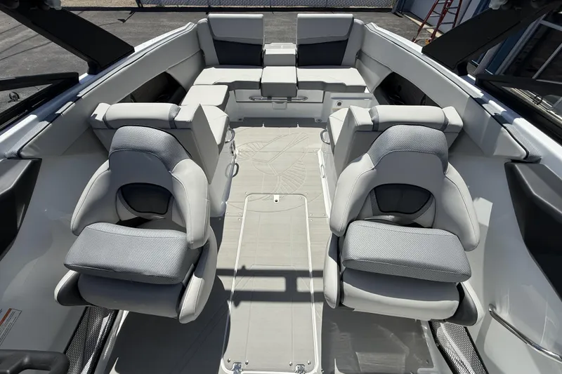 Slide: The Image of Interior of 2026 Scarab 255 SE boat with modern seating and sleek design. - 32
