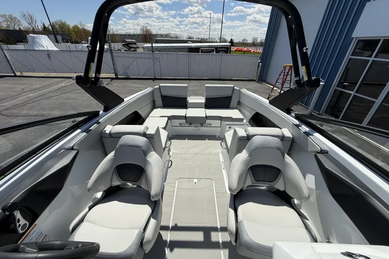 Slide: The Image of 2026 Scarab 255 SE boat interior with modern seating and sleek design. - 34