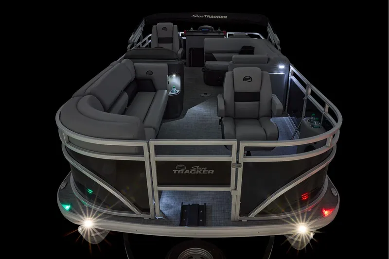 Slide: The Image of Manufacturer Provided Image: 2026 Sun Tracker SportFish 20 DLX pontoon boat with illuminated seating and modern design. - 19