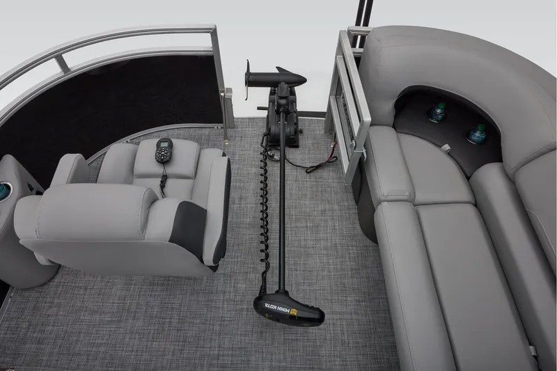 Slide: The Image of Manufacturer Provided Image: 2026 Sun Tracker SportFish 20 DLX interior with seating and trolling motor. - 27