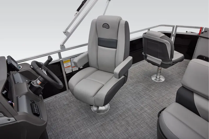 Slide: The Image of Manufacturer Provided Image: 2026 Sun Tracker SportFish 20 DLX interior with gray seating and steering console. - 36