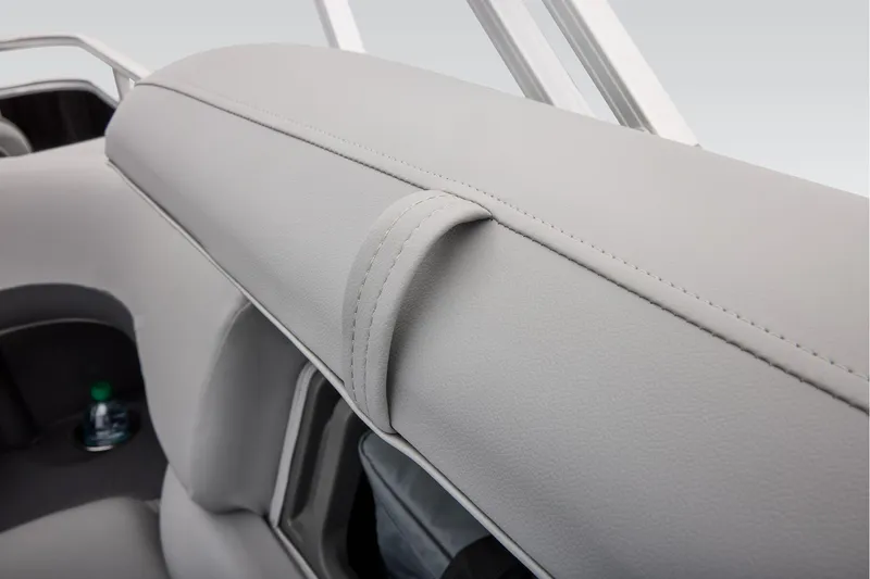 Slide: The Image of Manufacturer Provided Image: 2026 Sun Tracker SportFish 20 DLX boat seat detail with cup holder. - 54