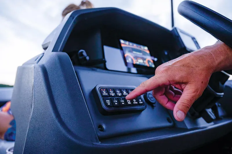 Slide: The Image of Manufacturer Provided Image: Control panel of 2026 Sun Tracker SportFish 20 DLX boat with touchscreen display. - 82