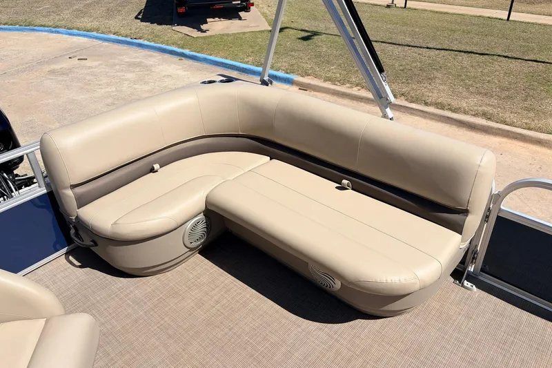 Slide: The Image of 2021 Sun Tracker Bass Buggy 16 XL pontoon boat with beige seating and spacious deck. - 26