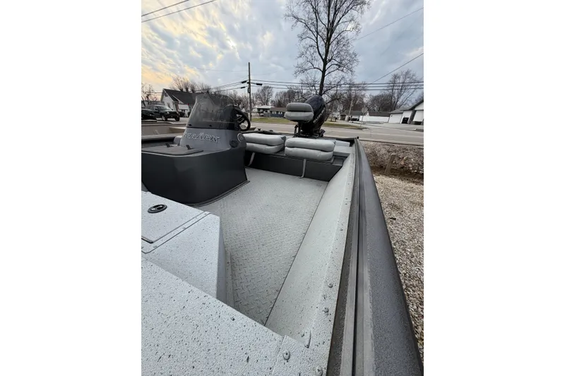 Slide: The Image of 2023 SeaArk 180 RX boat with spacious interior and comfortable seating. - 11