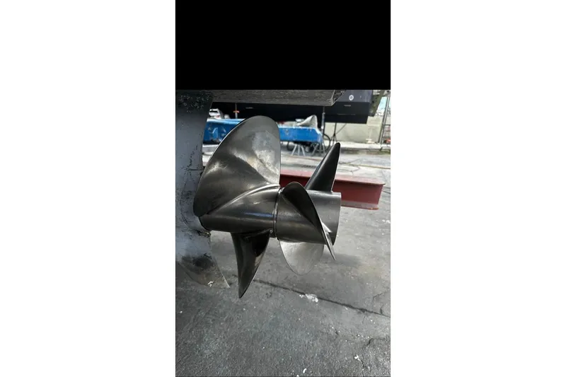 Slide: The Image of 2013 Beneteau Flyer GT 34 bathroom with sink, faucet, and porthole window. - 15