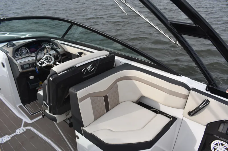Slide: The Image of 2024 Monterey 255SS Super Sport boat interior with sleek dashboard and comfortable seating. - 15