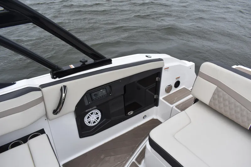 Slide: The Image of 2024 Monterey 255SS Super Sport boat interior with seating and audio system. - 21