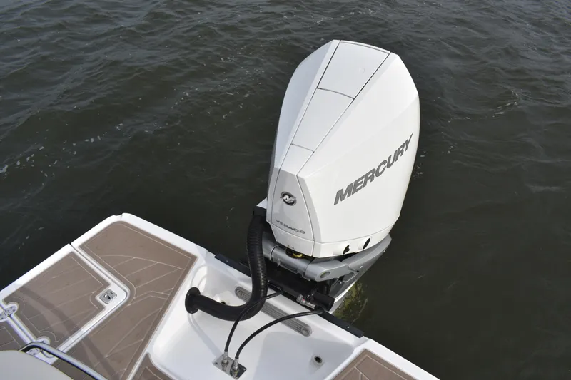 Slide: The Image of 2024 Monterey 255SS Super Sport with Mercury outboard engine on water. - 25