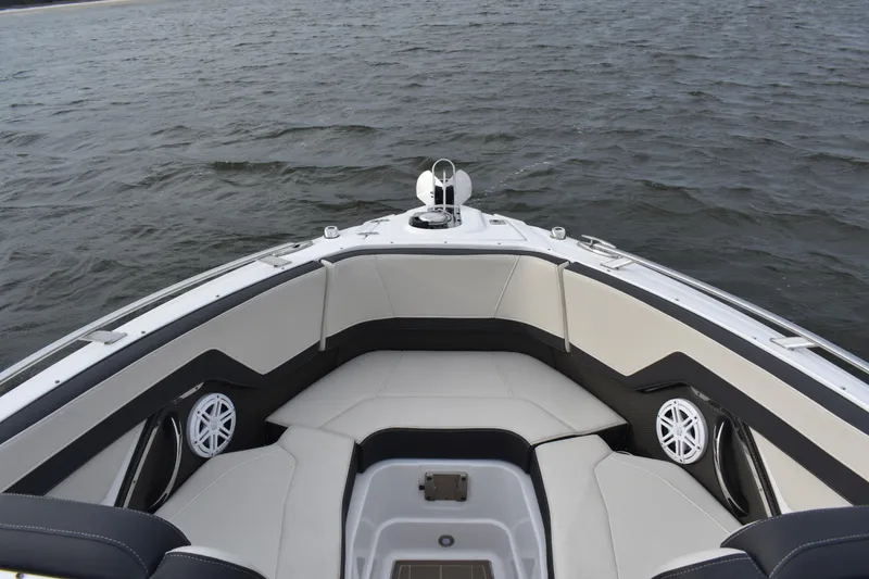 Slide: The Image of 2024 Monterey 255SS Super Sport boat interior with luxurious seating on open water. - 6