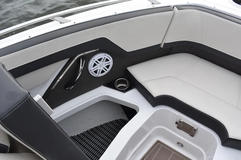 Slide: The Image of 2024 Monterey 255SS Super Sport boat interior with sleek seating and speaker system. - 8