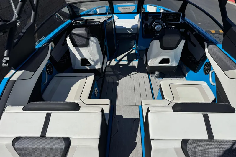 Slide: The Image of 2023 Yamaha Boats 222XD interior with modern seating and sleek design. - 10