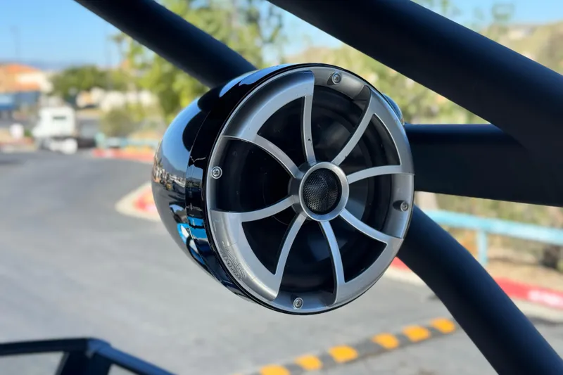 Slide: The Image of Close-up of a speaker on a 2023 Yamaha Boats 222XD. - 19