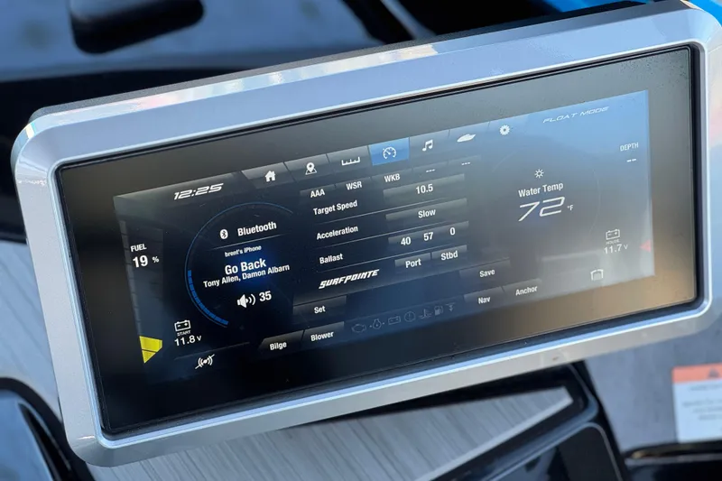 Slide: The Image of Touchscreen display on 2023 Yamaha Boats 222XD showing navigation and audio controls. - 32