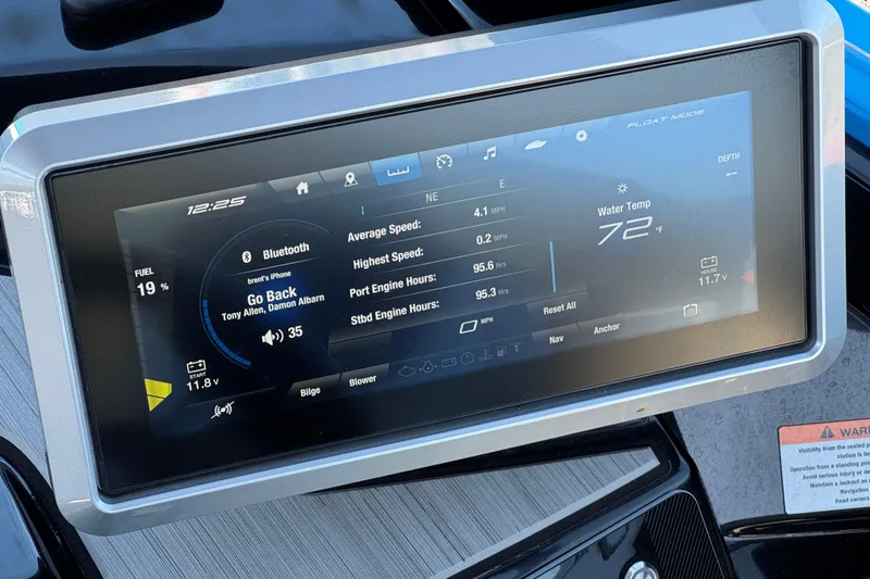 Slide: The Image of 2023 Yamaha Boats 222XD dashboard display showing speed, water temperature, and Bluetooth connectivity. - 33