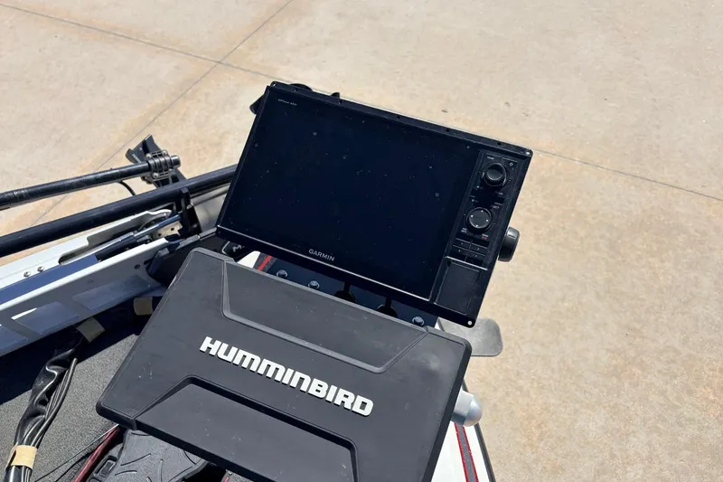 Slide: The Image of 2019 Skeeter FX21 Apex boat with Garmin and Humminbird electronics on deck. - 11