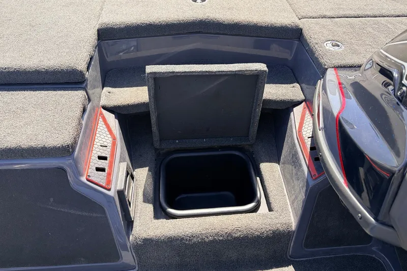 Slide: The Image of 2019 Skeeter FX21 Apex boat interior with open storage compartment. - 19