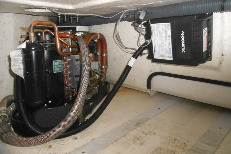 Slide: The Image of Control panel of 2007 Sea Ray 44 Sundancer with Raymarine navigation system. - 10