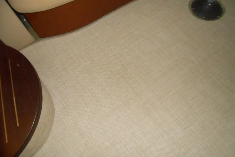 Slide: The Image of Control panel of 2007 Sea Ray 44 Sundancer with Raymarine display and throttle lever. - 12