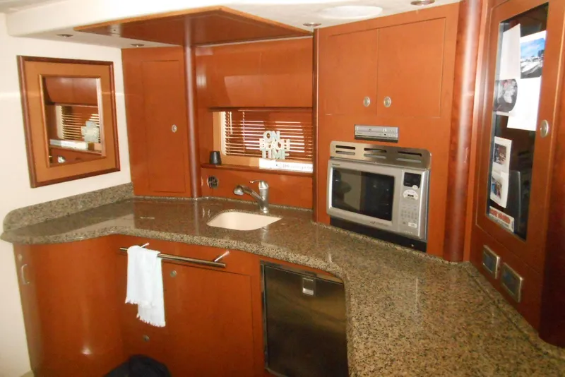 Slide: The Image of Engine room of 2007 Sea Ray 44 Sundancer with Dometic equipment and copper piping. - 13
