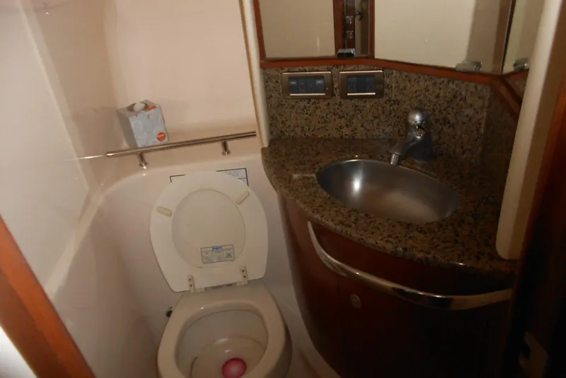 Slide: The Image of Luxurious interior seating of 2007 Sea Ray 44 Sundancer yacht with plush cushions. - 18