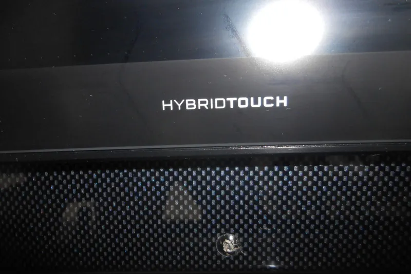 Slide: The Image of 2007 Sea Ray 44 Sundancer yacht interior with sink and storage cabinets. - 8