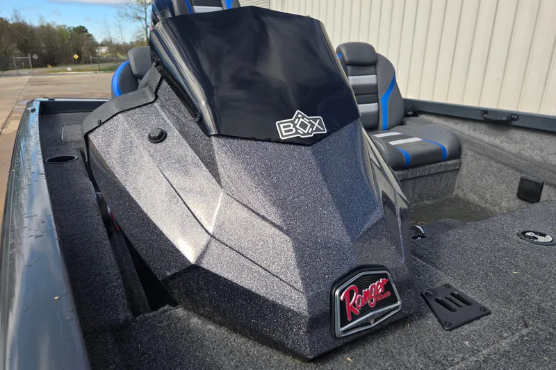 Slide: The Image of 2023 Ranger RT188P boat interior with sleek console design and comfortable seating. - 13