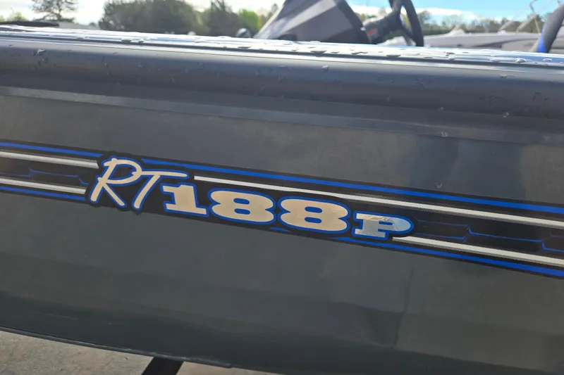 Slide: The Image of 2023 Ranger RT188P boat logo with blue and white lettering. - 6