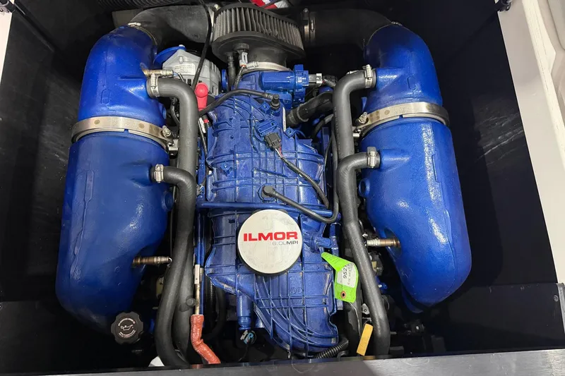 Slide: The Image of 2020 MasterCraft NXT22 Ilmor engine, blue components, detailed view. - 14