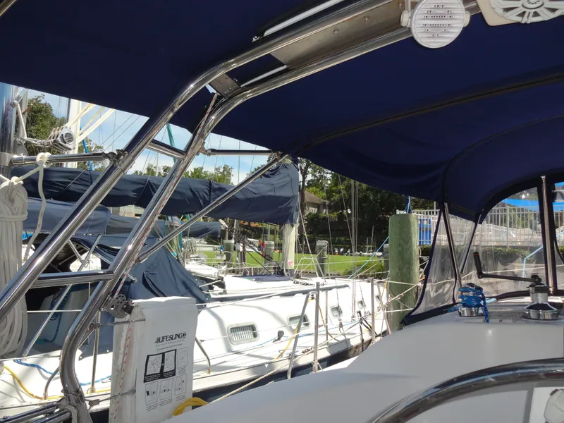 Slide: The Image of Interior view of a 2001 Hunter 380 sailboat docked at marina. - 22