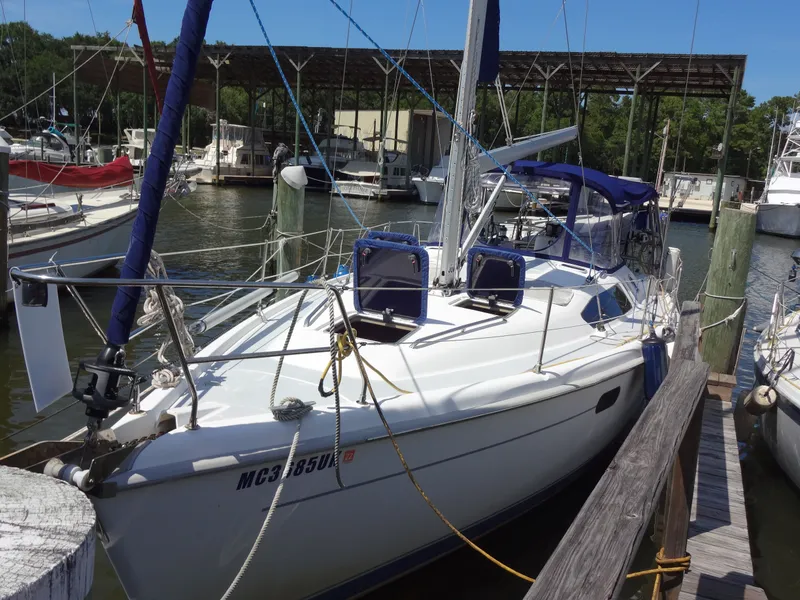 Slide: The Image of 2001 Hunter 380 sailboat docked at marina. - 4