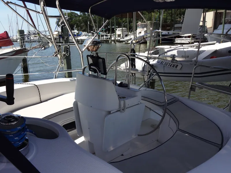 Slide: The Image of Cockpit of a 2001 Hunter 380 sailboat in a marina. - 7