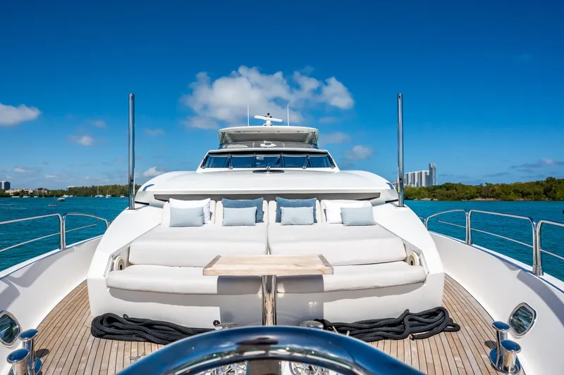 Slide: The Image of Luxurious 2011 Sunseeker 34 Metre Yacht on serene blue waters under clear skies. - 12