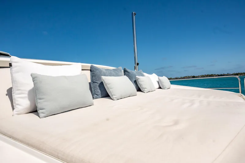 Slide: The Image of Sunseeker 34 Metre Yacht 2011 sun deck with cushions under clear blue sky. - 14
