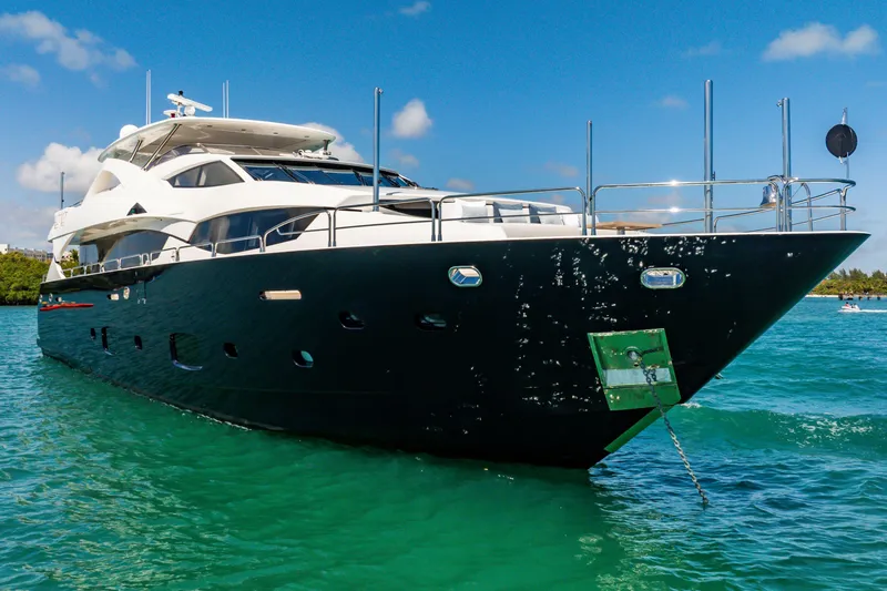 Slide: The Image of Luxurious 2011 Sunseeker 34 Metre Yacht cruising on turquoise waters under a clear blue sky. - 2
