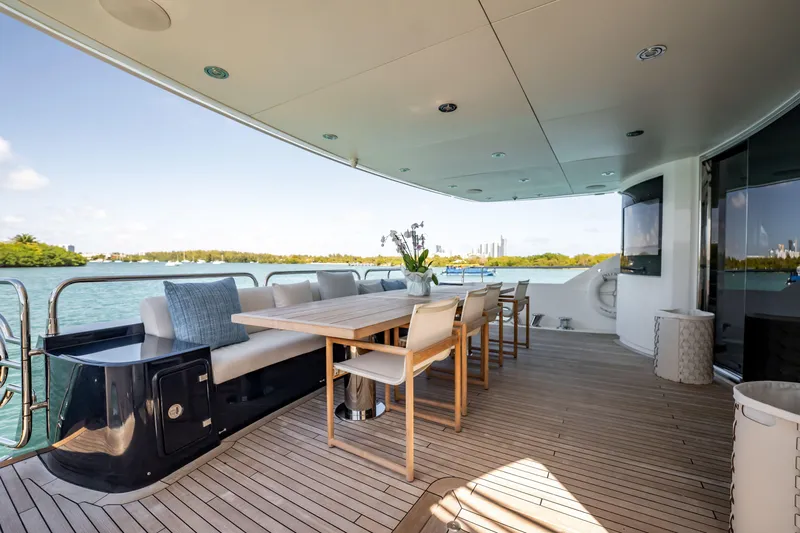 Slide: The Image of Luxurious deck of 2011 Sunseeker 34 Metre Yacht with elegant seating and scenic view. - 28