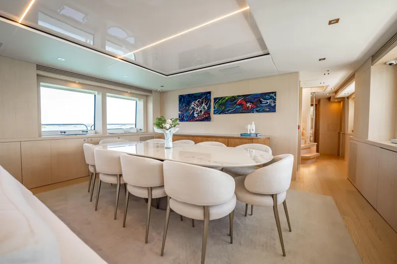 Slide: The Image of Luxurious dining area on a 2011 Sunseeker 34 Metre Yacht with elegant decor. - 35