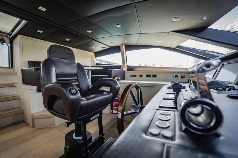 Slide: The Image of Luxurious helm of 2011 Sunseeker 34 Metre Yacht with leather captain's chair. - 40